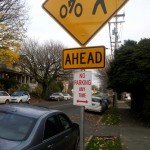 A fake-looking no parking sign in Portland, Oregon