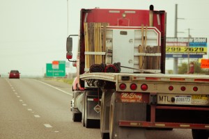 Commercial Truck with Tandem Axle leaves the weigh station